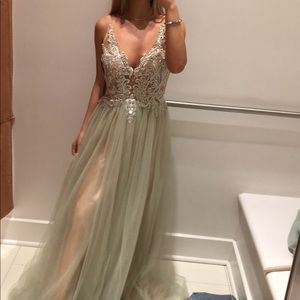 beige and green embellished gown